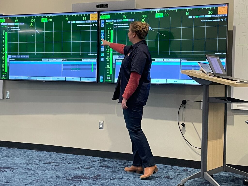 Regina Yopak, Product Manager of Science and Research Technologies at Greensea IQ, presents to WHOI during a visit in 2023.